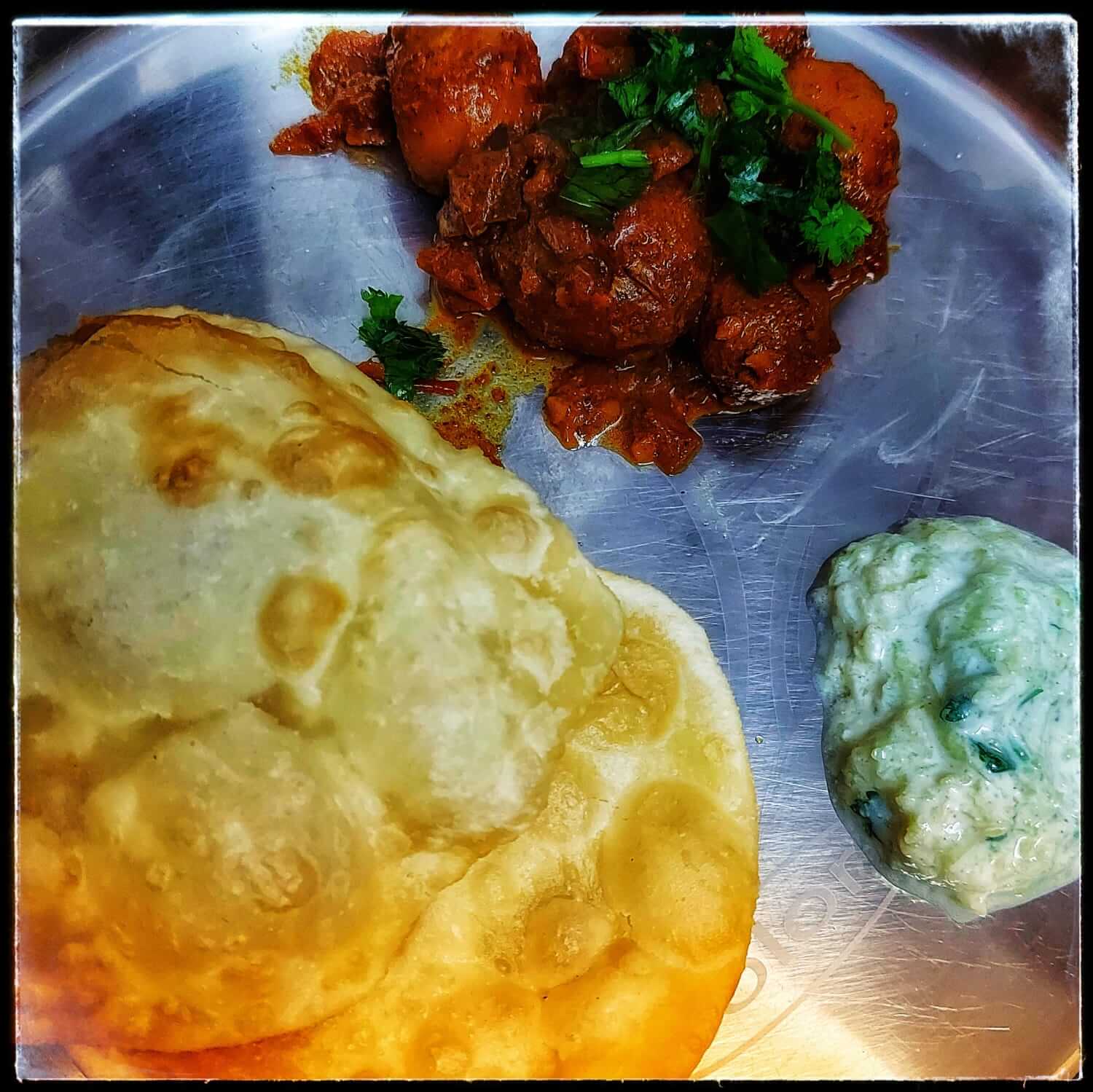 Day 1 West Bengal: Bengali Aloo Dum with Luchis and Lauki ka Raita -  Chalo!Travels